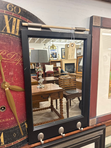 Mirror with hooks