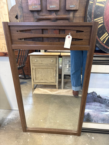 Mirror with wood cutout on top